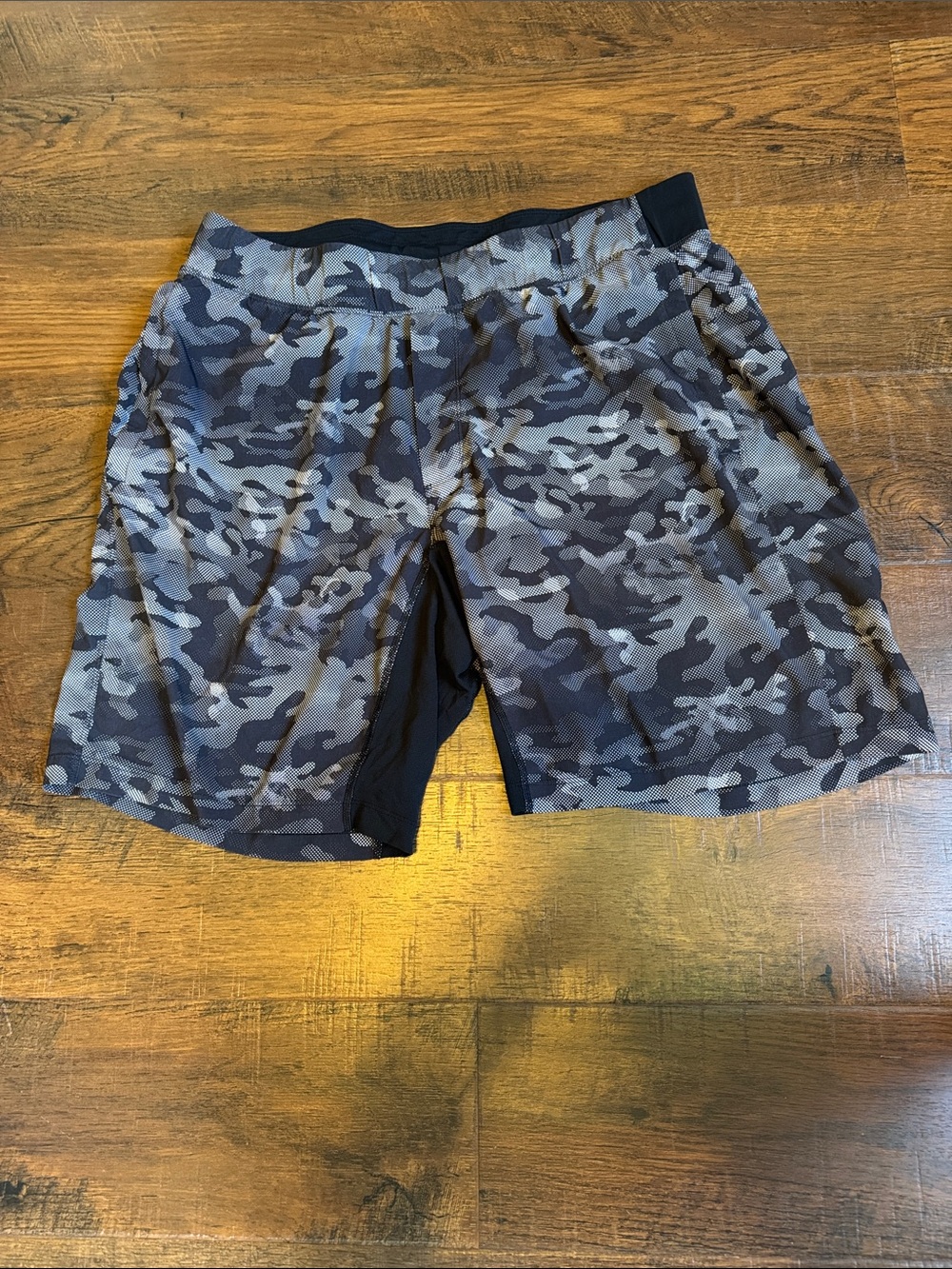 Amazing men’s Lululemon shorts size large. Black and gray camo pattern.